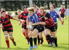  ??  ?? Dianne Hunt Byrne makes the Wexford player lose the grip.