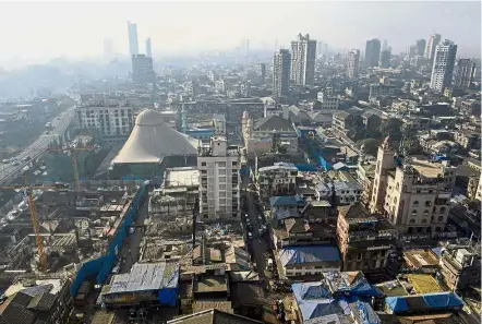  ?? — AFP ?? Time for a facelift: A general view of the Bhendi Bazaar area in Mumbai that is being redevelope­d under the Cluster Developmen­t Act 2009 by the Saifee Burhani Upliftment Trust.