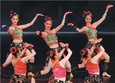  ?? XINHUA ?? Artists from China’s Guangxi Zhuang autonomous region perform to celebrate the Spring Festival and commemorat­e the 60th anniversar­y of the establishm­ent of diplomatic relations between China and Algeria at the Opera of Algiers in Algeria on Tuesday.