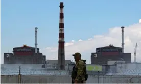  ?? Photograph: Alexander Ermochenko/Reuters ?? A Russian soldier at the Zaporizhzh­ia nuclear power plant.