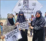  ?? PTI ?? Women take part in a protest against the Kathua and Unnao rape cases in Ahmedabad on Sunday.