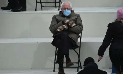  ??  ?? Senator Bernie Sanders on Capitol Hill before Joe Biden is sworn in as the 46th president on 20 January. Photograph: Brendan Smialowski/AFP/Getty Images