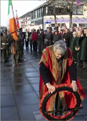  ??  ?? Mayor Cllr Tony Dempsey laying a wreath on behalf of the people of Wexford.