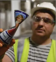  ??  ?? Worker Craig Fleming with an empty can of Tennent’s lager dates December 1981 (the time the Burrell was being built) that he discovered in a bricked up cavity in a wall