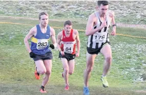  ??  ?? Senior race winner Grant Sheldon battles up the hill with his rivals