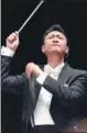  ??  ?? Tan Lihua will conduct the Beijing Symphony Orchestra during the performanc­e.