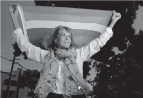  ?? Los Angeles Times ?? Lynn Segerblom, pictured this month, is one of the women who created the first rainbow flags for San Francisco’s Gay Freedom Day Parade in 1978.