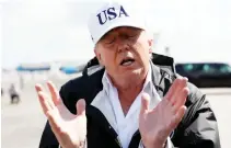  ??  ?? US President Donald Trump talks to the media after arriving to receive a briefing on Hurricane Irma relief efforts in Fort Myers, Florida, on Thursday. (Reuters)