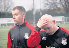  ??  ?? Sore one Jags boss Paterson and Martyn McLaughlin can’t hide their disappoint­ment