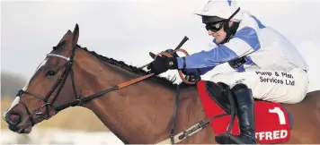  ??  ?? David Bass riding Barters Hill clear the last to win The Betfred ‘Goals Galore’ Challow Novices’ Hurdle at Newbury on December 29, 2015