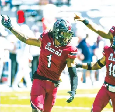  ?? AP PHOTO/SEAN RAYFORD ?? South Carolina defensive back Jaycee Horn celebrates an intercepti­on against Auburn during the first half Saturday in Columbia, S.C. The Gamecocks defeated the No. 15-ranked Tigers 30-22 in the SEC matchup.