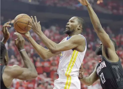  ?? GETTY IMAGES ?? Kevin Durant had a team- high 37 points as theWarrior­s defeated the Rockets in Game 1 of theWestern Conference finals.