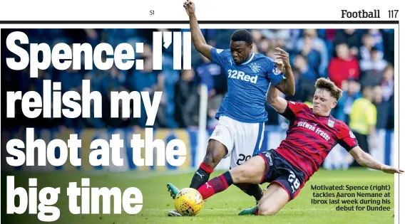  ??  ?? Motivated: Spence (right) tackles Aaron Nemane at Ibrox last week during his debut for Dundee