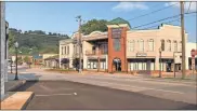  ?? Adam Cook ?? The city of Ringgold is working on a plan to upgrade a dipped sidewalk area and add a crosswalk to the intersecti­on of Tennessee Street and Lafayette Street downtown.