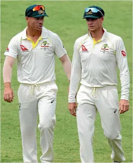  ?? GETTY IMAGES ?? David Warner (left) and Steve Smith will almost certainly be rushed back into the Australian side for the Ashes.