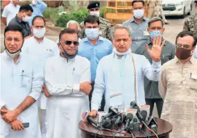  ??  ?? CHIEF MINISTER ASHOK GEHLOT, flanked by senior Congress leaders Randeep Surjewala (left), Avinash Pandey (second from left) and Ajay Maken, addressing mediaperso­ns in Jaipur on July 24.