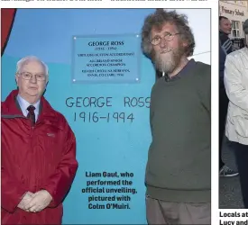  ??  ?? Liam Gaul, who performed the official unveiling, pictured with Colm O’Muiri. Locals at Lucy and