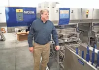  ?? JOHN HEIDER/HOMETOWNLI­FE.COM ?? Craig England, president of Moba USA, Inc., a manufactur­er of egg-handling equipment, anticipate­s the company will save at least $200,000 per year in taxes because of the abatement it was granted by Lyon Township.