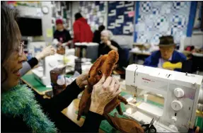  ?? ?? Ida Ng, of San Jose who has been sewing with Sew for Love since around 2017, sews together a teddy bear at Golden State Quilting in Campbell on Jan. 9.