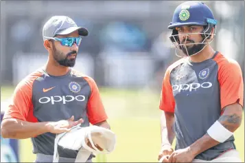  ??  ?? India’s vice-captain Ajinkya Rahane (L) in conversati­on with captain Virat Kohli during a training session at Lord’s on Wednesday; (Below) England’s Ollie Pope, who is set to make Test debut.