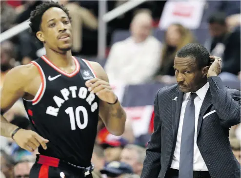  ?? ROB CARR/GETTY IMAGES ?? One positive statistic for head coach Dwane Casey, DeMar DeRozan and the rest of the Raptors heading into Game 5 of the series with the Wizards is that they did not lose three games in a row during the entire season.