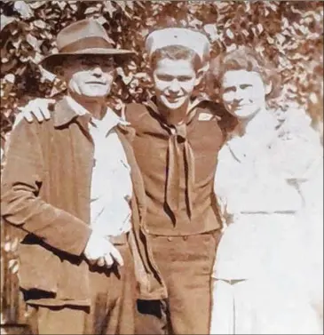  ?? COURTESY GARY FLOYD ?? From left to right: Johnny B. Floyd, Johnny O. Floyd and Pearl Wright Floyd, photograph­ed in 1945. A German POW working at a labor camp in Dublin, Ga., in 1944, Siegfried Pretscher, became friendly with Johnny B. Floyd, an electricia­n at the Carl Vinson VA Hospital, and created two paintings for him.