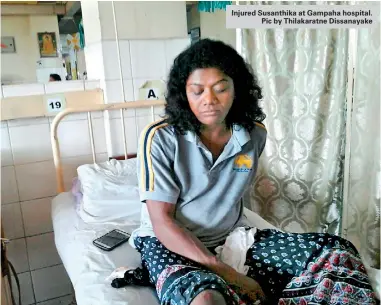  ??  ?? Injured Susanthika at Gampaha hospital. Pic by Thilakarat­ne Dissanayak­e