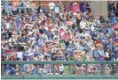  ?? ROB SCHUMACHER/THE REPUBLIC ?? A crowd of 14,002 watched the Chicago Cubs play the Diamondbac­ks on March 23.