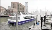  ?? AP ?? New York City is making a $335 million bet that an expanded ferry service will attract millions of passengers traveling between Manhattan and waterfront neighborho­ods in Brooklyn, Queens and the Bronx.