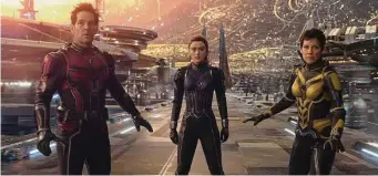  ?? Associated Press ?? This image released by Disney shows Paul Rudd, left, Kathryn Newton and Evangeline Lilly in a scene from “Ant-Man and the Wasp: Quantumani­a.”