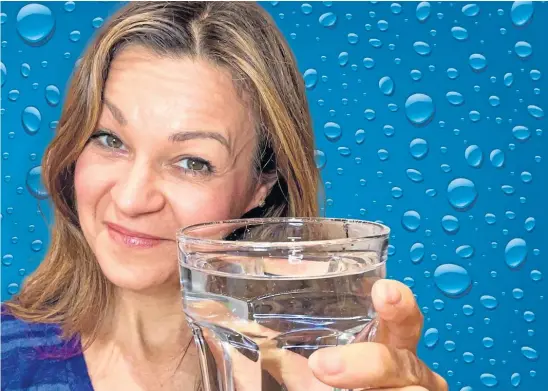  ?? ?? CHEERS: Clare has found that drinking plenty of water helps everything from relieving headaches to getting a good night’s sleep.