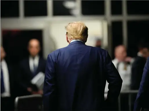  ?? Picture: AP Photo/mary Altaffer, Pool ?? Former President Donald Trump heads to the courtroom after speaking at Manhattan criminal court yesterday in New York where a judge worked to find a panel of jurors.