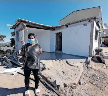  ?? SIBONELO NGCOBO African News Agency (ANA) ?? ABOVE: Maria Magdalene Gunnie stands in front of what once was a bedroom built for her grandchild­ren. It was bulldozed by the city. |