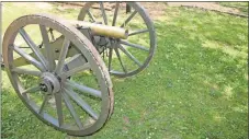  ?? Kristina Wilder / Rome News-Tribune ?? Chad Matthews made this confederat­e mountain rifle in 2014. The barrel is solid bronze and the wheels and carriage are made from oak and ash. It took him about a year to complete, he said.