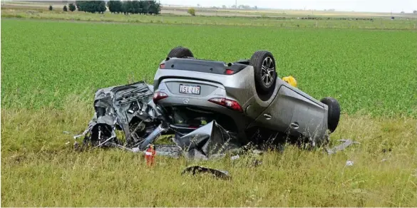  ??  ?? HORROR SCENE: A Toowoomba man, 33, died in a single-vehicle rollover on the New England Highway yesterday. PHOTO: ELYSE WURM