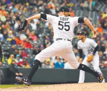  ?? John Leyba, The Denver Post ?? Rockies pitcher Jon Gray delivers during the third inning Wednesday against the Miami Marlins at Coors Field. Gray (10-4) struck out five and walked none in six innings.