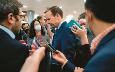  ?? KENT NISHIMURA/LOS ANGELES TIMES ?? Chris Murphy, D-Conn., talks to the media about talks on gun safety legislatio­n last week in Washington.