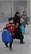  ?? Photo: Getty ?? Syrians run for cover in Eastern Ghouta yesterday.