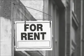  ?? MATT ROURKE/AP ?? A “FOR RENT” SIGN is posted on a building, Jan. 18, in Philadelph­ia.