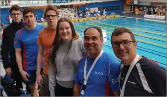  ??  ?? Eanna O’Hara, Ronan Anderson, Peter Mooney, Carrie McDaid, Eduardo Santos ( coach) and Trevor McDaid ( chairperso­n Co Sligo Swim Club at the Irish Open Swim Championsh­ips in the National Aquatic Centre.