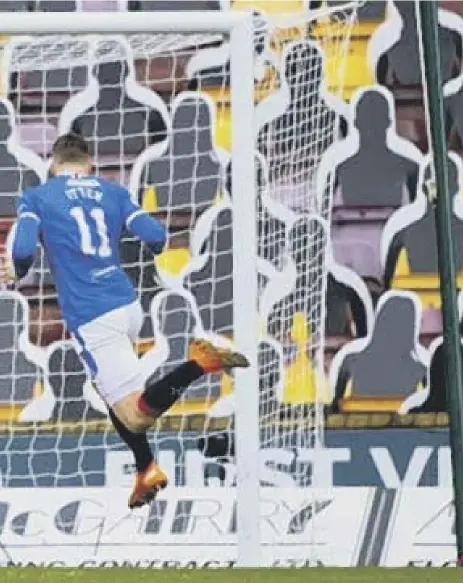  ??  ?? 2 Cedric Itten, who came on as a second-half substitute, heads home from a Borna Barisic cross to secure a share of the spoils for Rangers at Motherwell yesterday. Well had taken the lead through Devante Cole in the 21st minute.