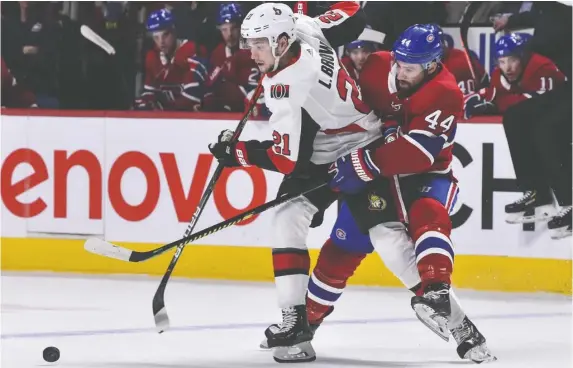  ?? MINAS PANAGIOTAK­IS/GETTY IMAGES FILES ?? On Wednesday the Ottawa Senators sent 22-year-old centre Logan Brown, left, to Belleville Senators of the American Hockey League from the NHL club's taxi squad. The idea is for Brown to finally see some game action — Belleville opens its season Friday against the Laval Rocket — to prepare him for an eventual return to Ottawa.