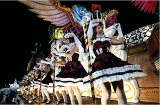  ?? AFP PHOTO ?? DANCE THE NIGHT AWAY
Members of the Unidos da Tijuca samba school perform during the first night of Brazil’s famed Carnival at the Marques de Sapucai Sambadrome in the southeaste­rn city of Rio de Janeiro on Monday, Feb. 12, 2024.