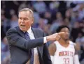  ??  ?? Rockets coach Mike D’Antoni argues with officials during the first half Friday in a game against the Suns.