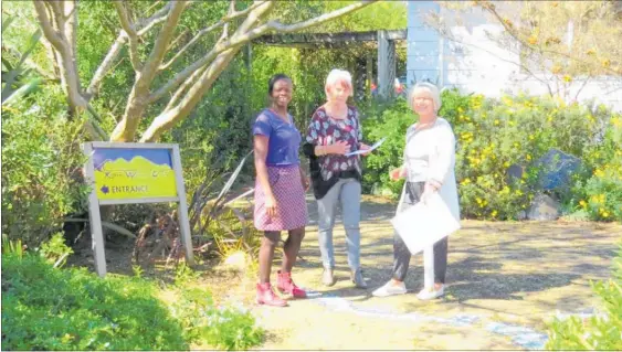  ??  ?? Kapiti Women’s Centre co-ordinator Louise Waterworth, previous co-ordinator Rae Lutman and Laura van Peer from Kapiti Women’s Electoral Lobby at Ka¯ piti’s Suffrage Centennial Garden.