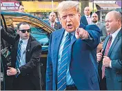  ?? AFP ?? Donald Trump visits a bodega store in upper Manhattan where a worker was assaulted by a man in 2022 and ended up killing him in an ensuing fight in New York City, on Tuesday.