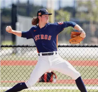  ?? Karen Warren/Staff photograph­er ?? Former first-round pick Forrest Whitley enters the spring healthy, giving the one-time top prospect a chance to show he can finally make his major league debut.