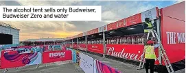  ?? ?? The alcohol tent sells only Budweiser, Budweiser Zero and water