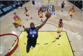  ?? KYLE TERADA — POOL PHOTO VIA AP ?? Team Lebron forward Lebron James (6) dunks during the first half of Sunday’s All-star game in Salt Lake City.