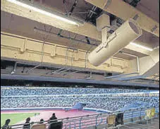  ??  ?? The eaves around the outer perimeter keep out sunlight and rain and will help channel breeze into Tokyo’s new national stadium. There are also eight mist spraying facilities, 185 fans and 16 air-conditione­d lounges to beat the heat during the Olympics.